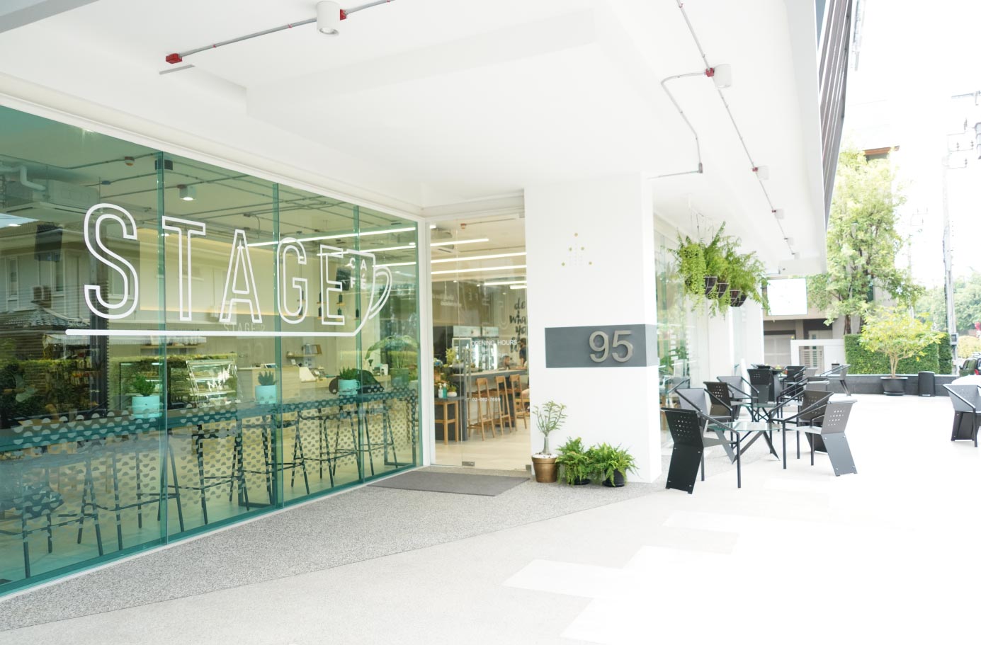 STAGE glass entrance and outdoor seating area